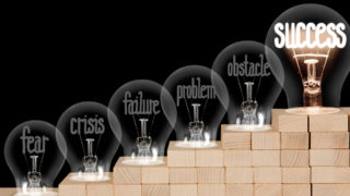 Light Bulbs with Fear, Crisis, Failure and Success Concept