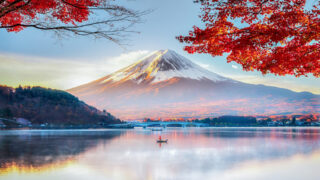 Fuji Mountain , Red Maple Tree and Fisherman Boat with Morning Mist in Autumn, Kawaguchiko Lake, Japan